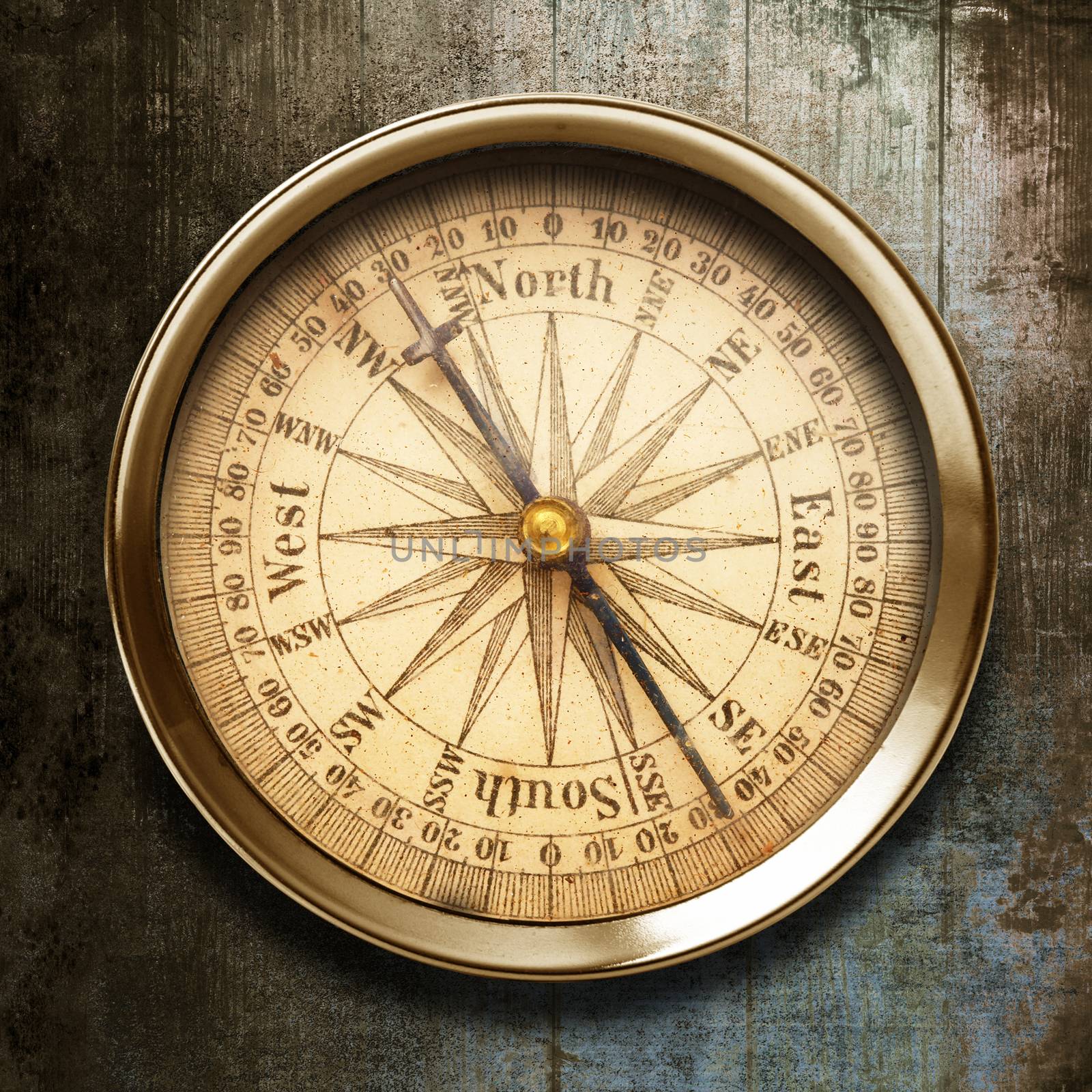 old compass on vintage background