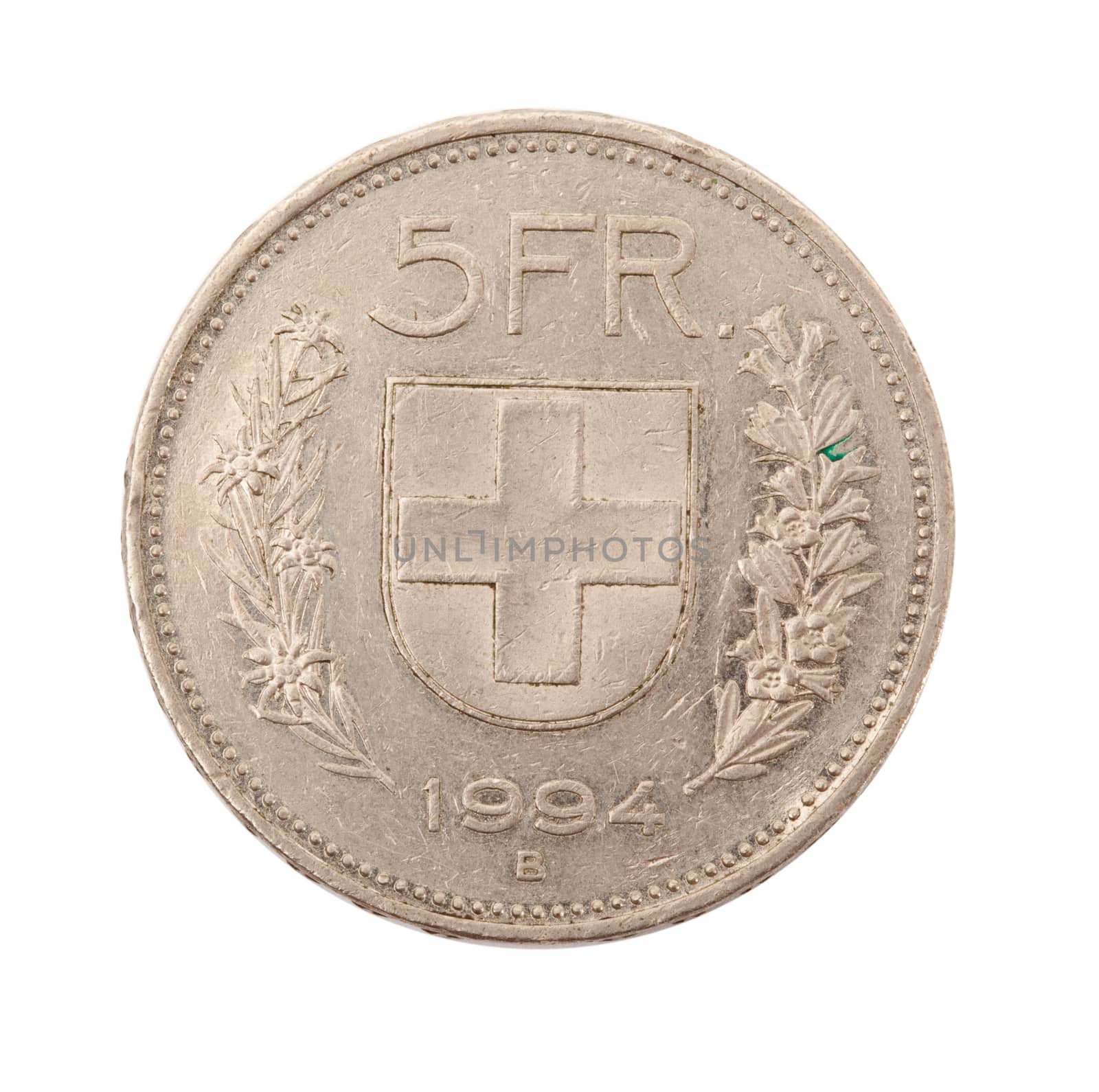 vintage metal coin on white background