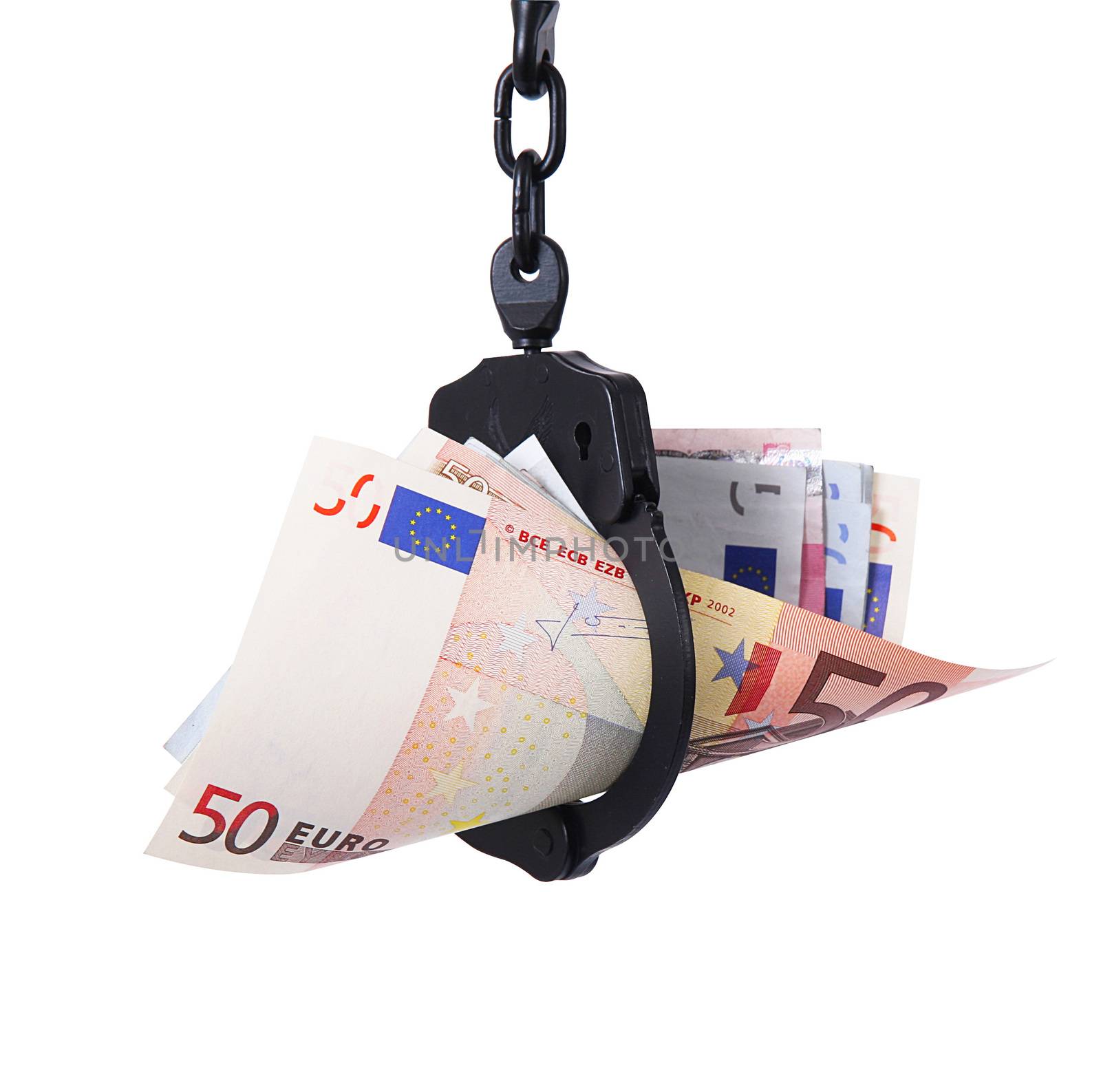 Money under handcuffs on white background