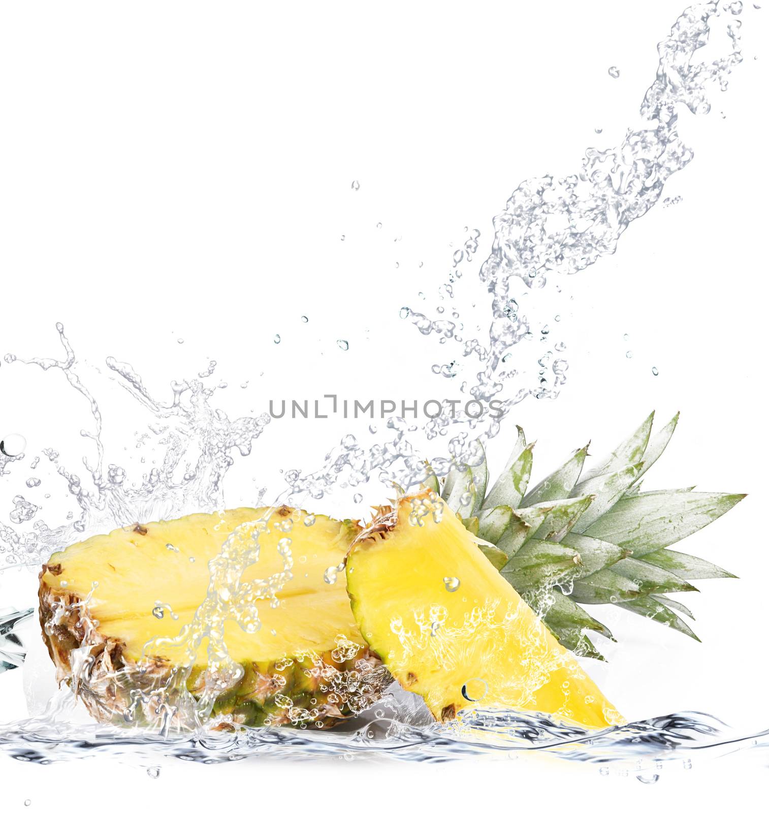 fresh pineapple falling in water