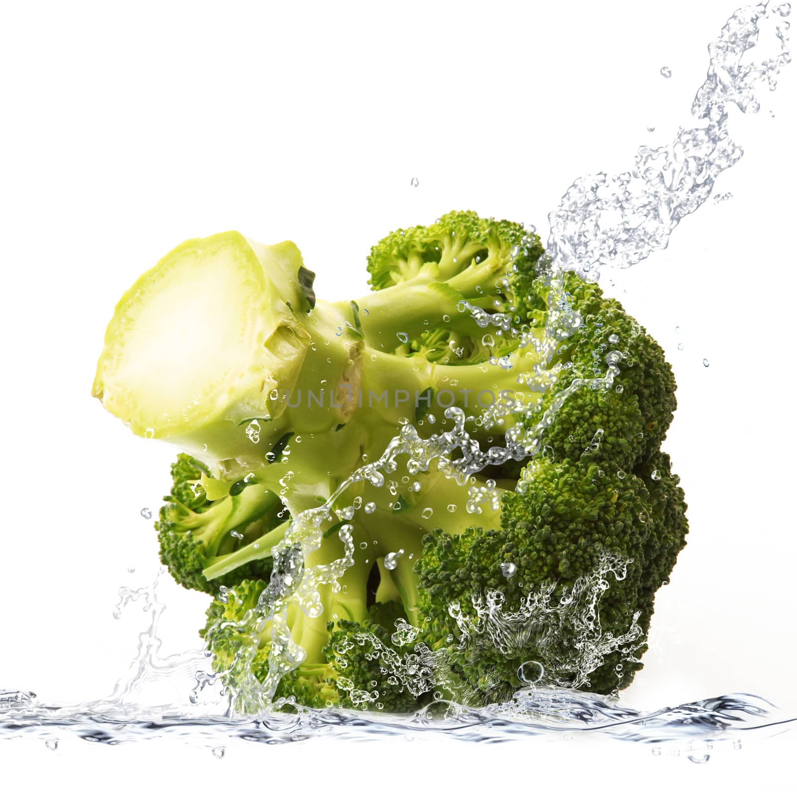 Fresh cabbage falling in pure water