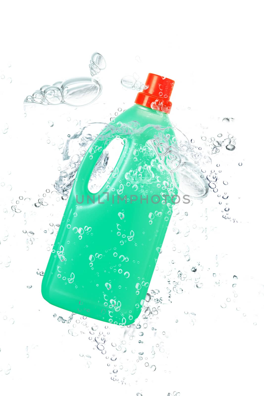 green plastic bottle falling in water
