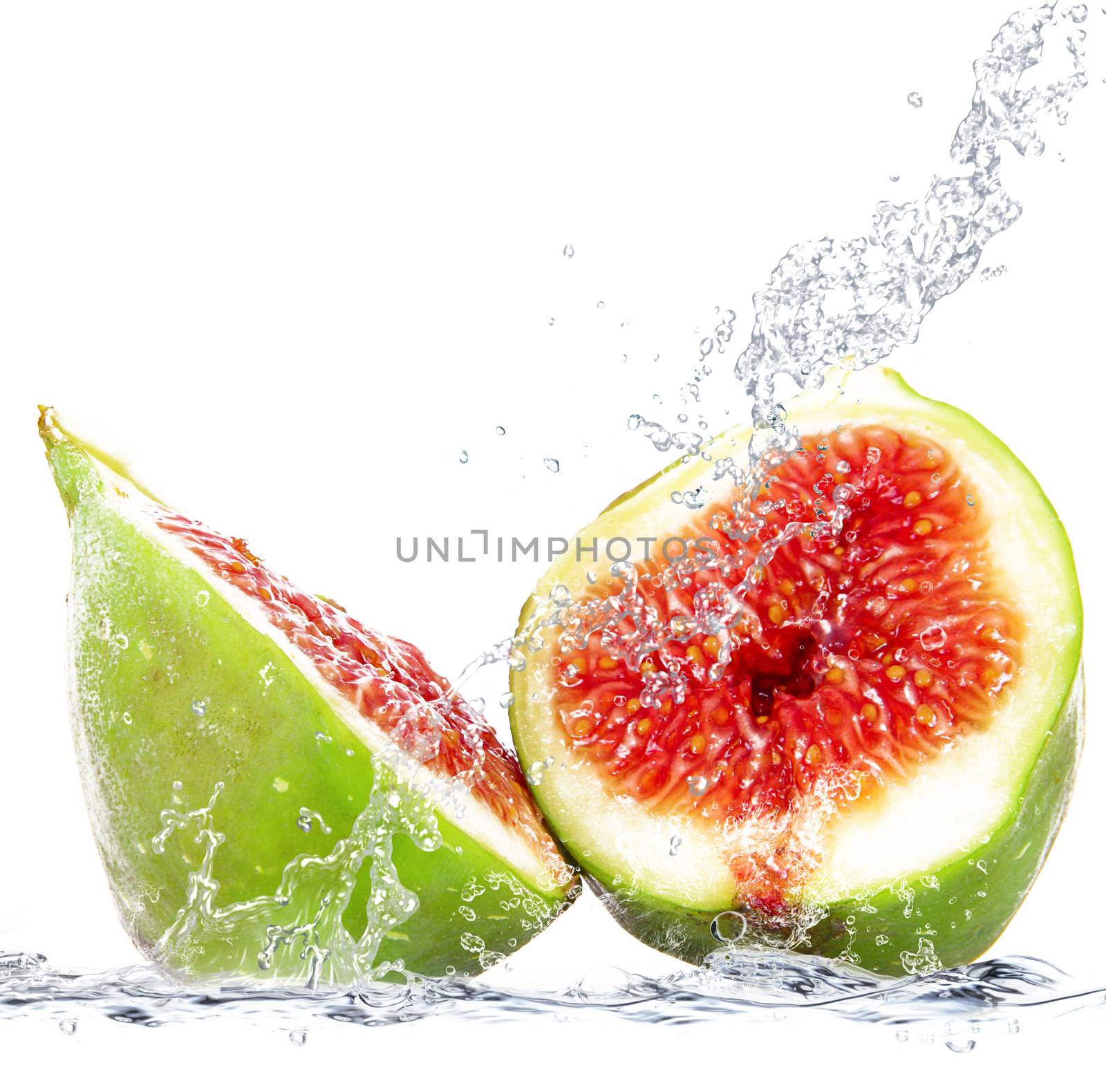 fresh fig falling in water