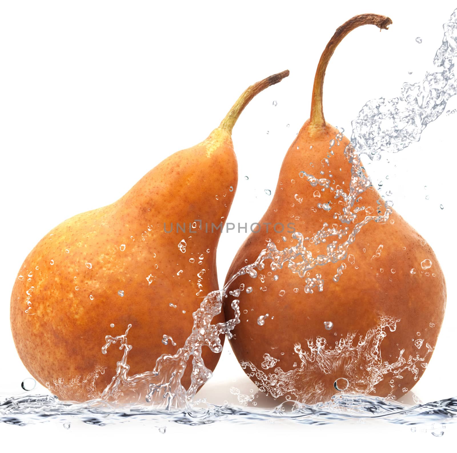 fresh pear falling in water