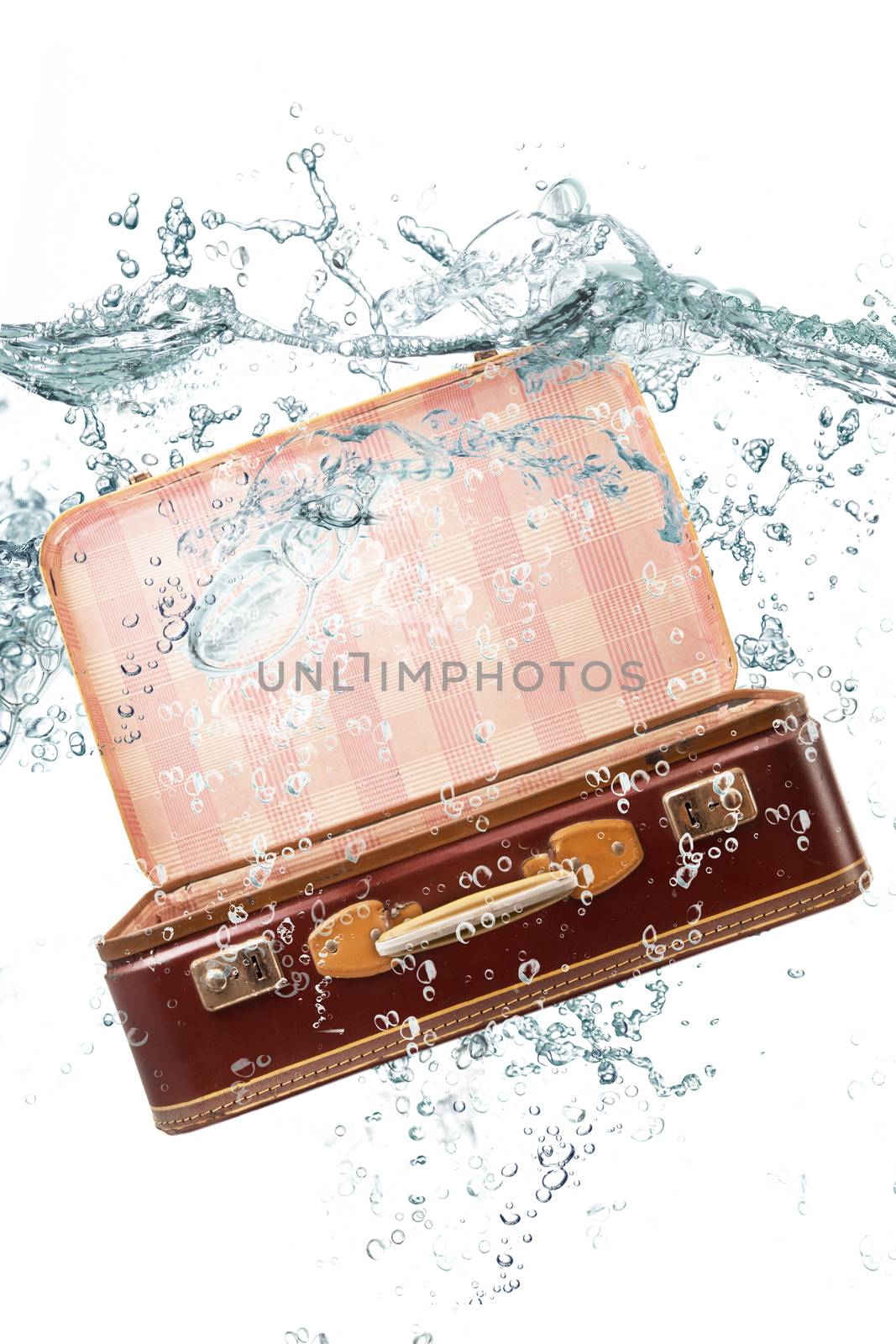 fresh in suitcase falling in water
