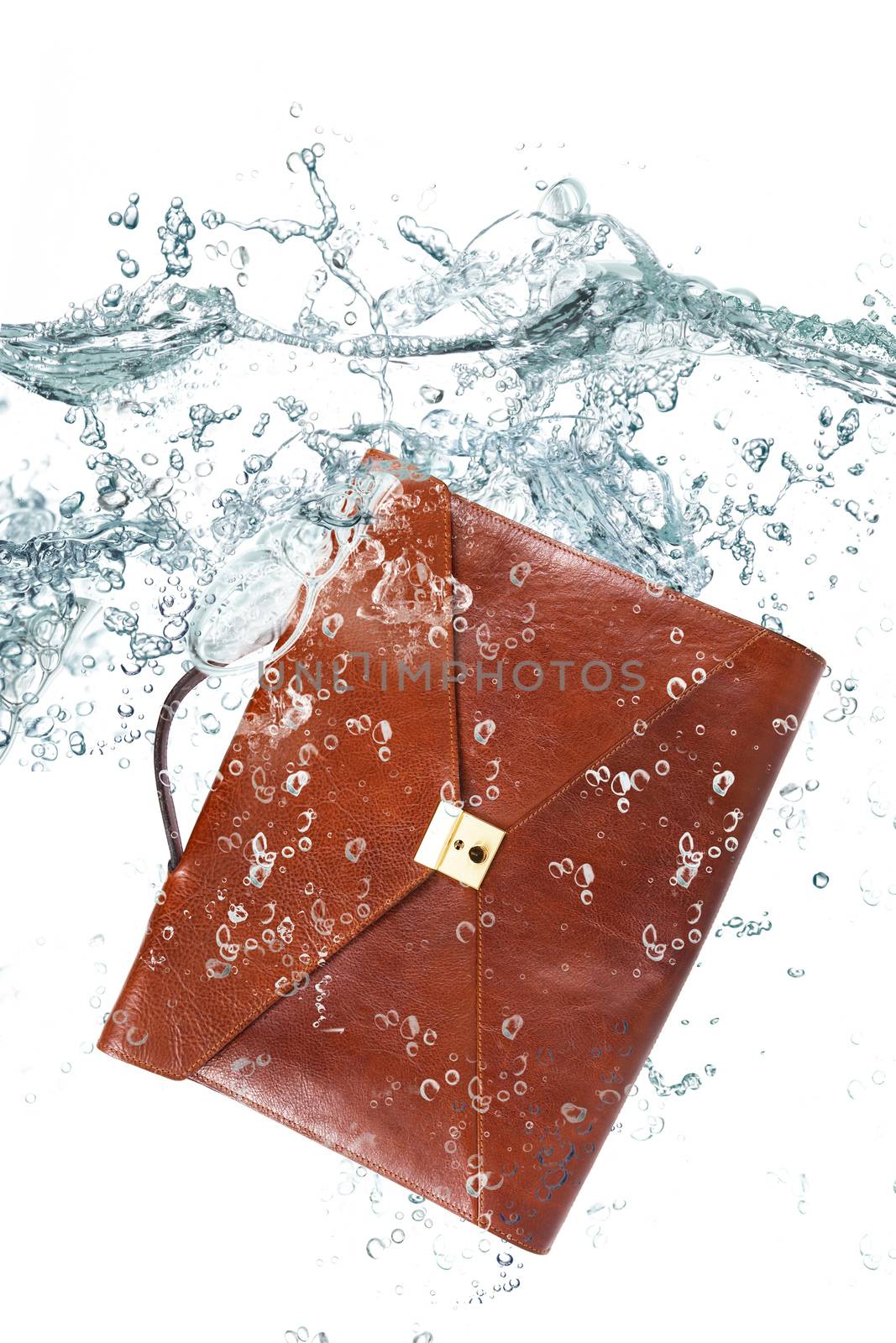 little suitcase falling in water