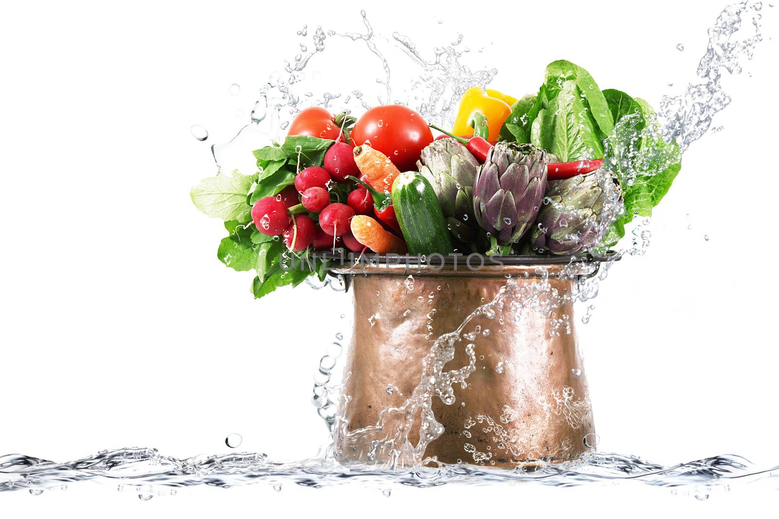 fresh vegetables in  big copper pot