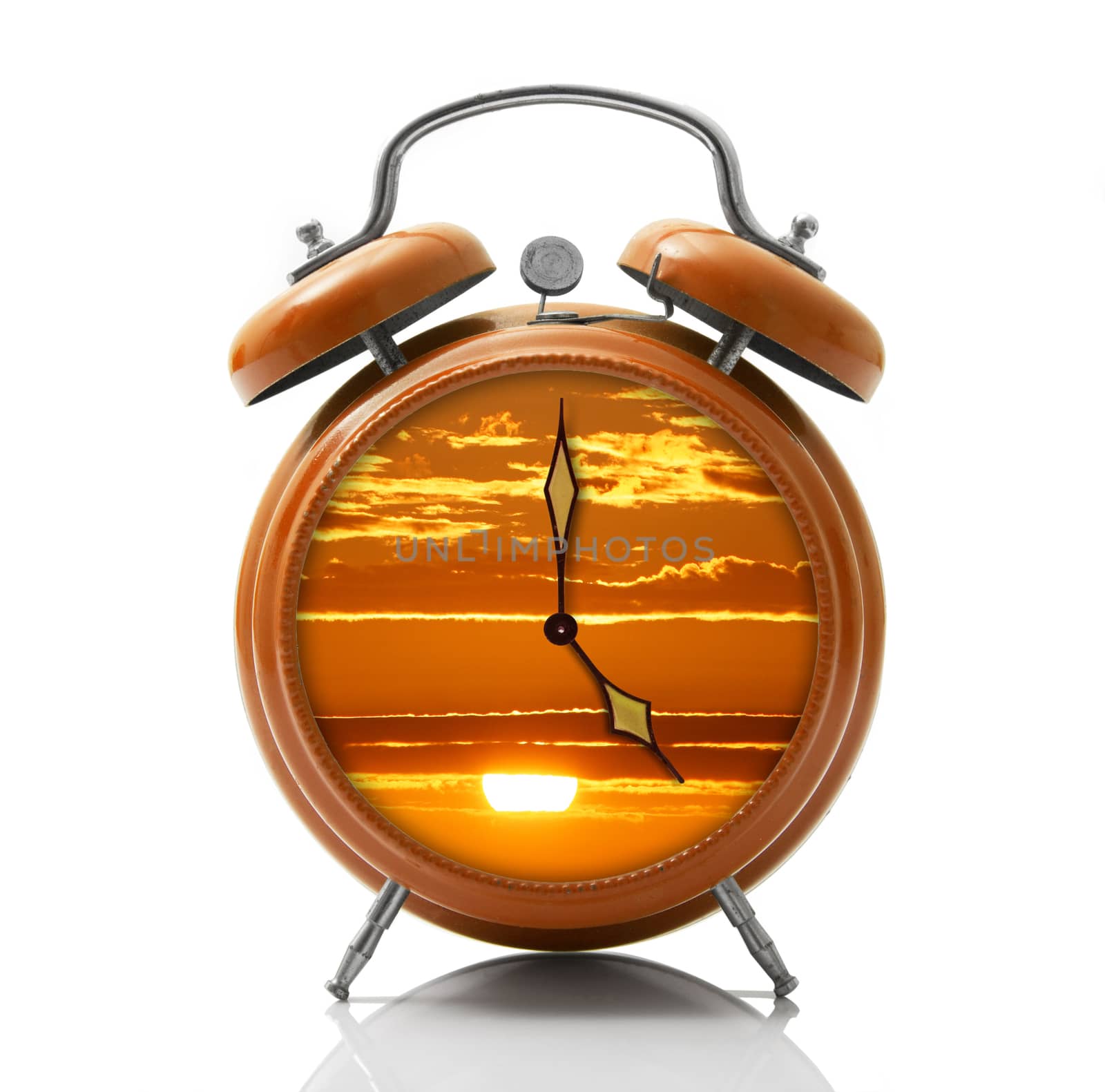 alarm clock with sunset dial on white background by photobeps