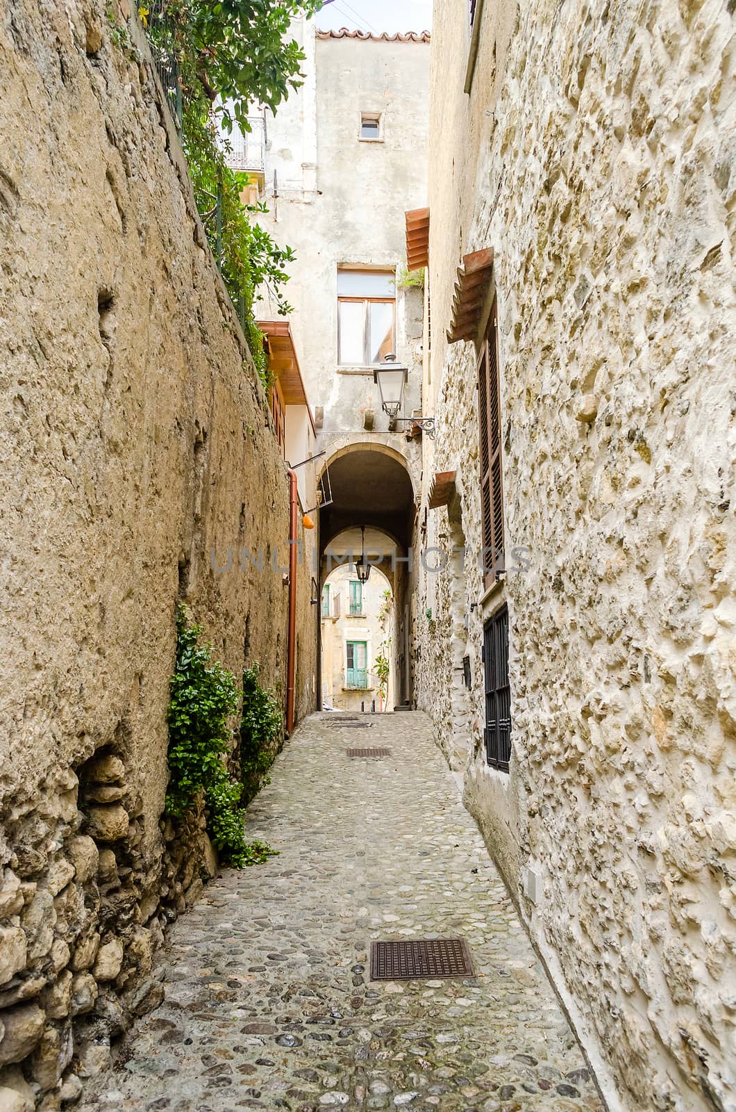 Ancient street in old town of a southern Italy village by marcorubino