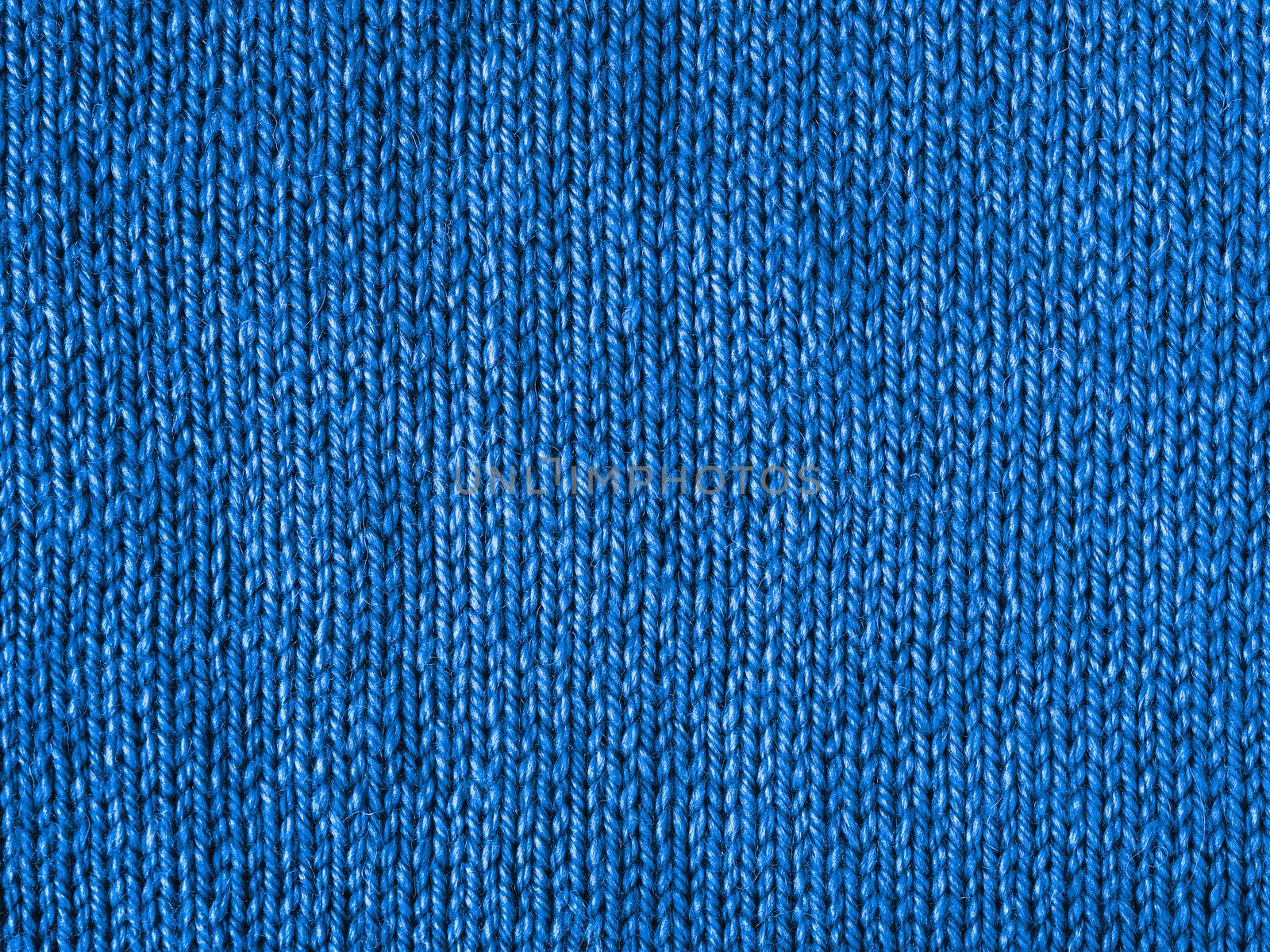 Blue knitted Jersey as color 2020 background by fascinadora