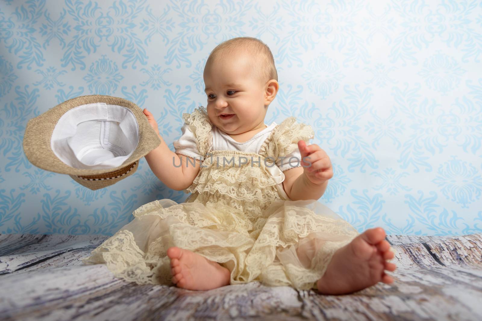 Portrait of adorable baby girl. Childhood. Authentic image