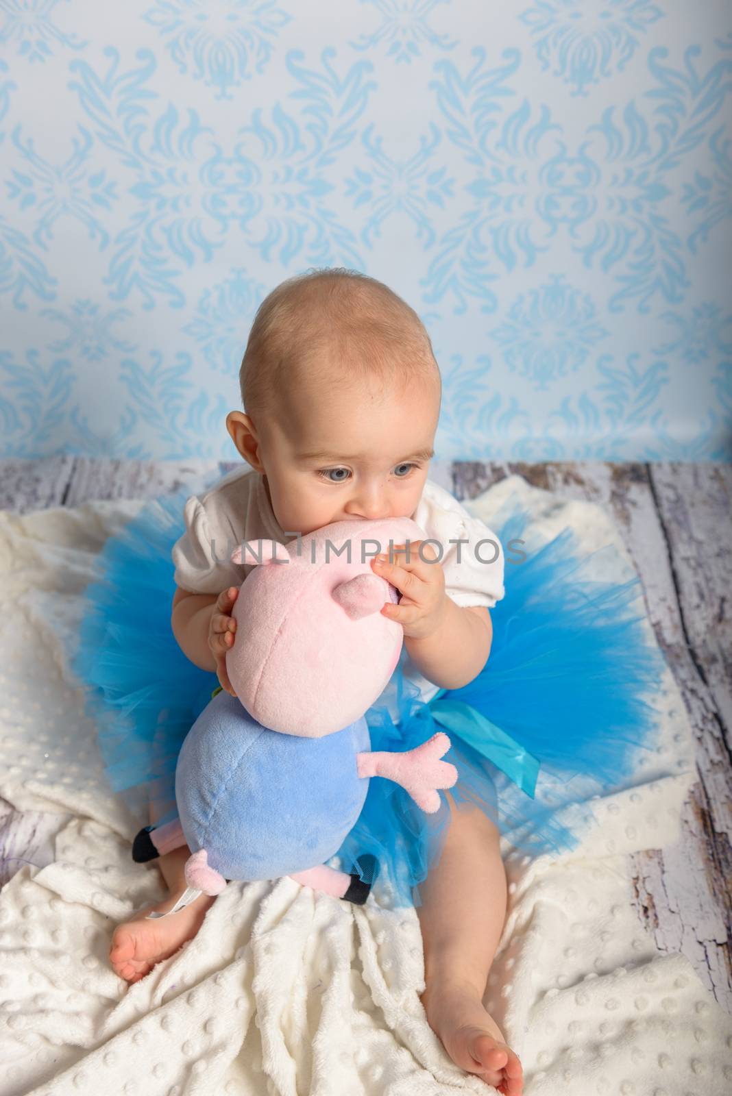 Portrait of adorable baby girl. Childhood. Authentic image