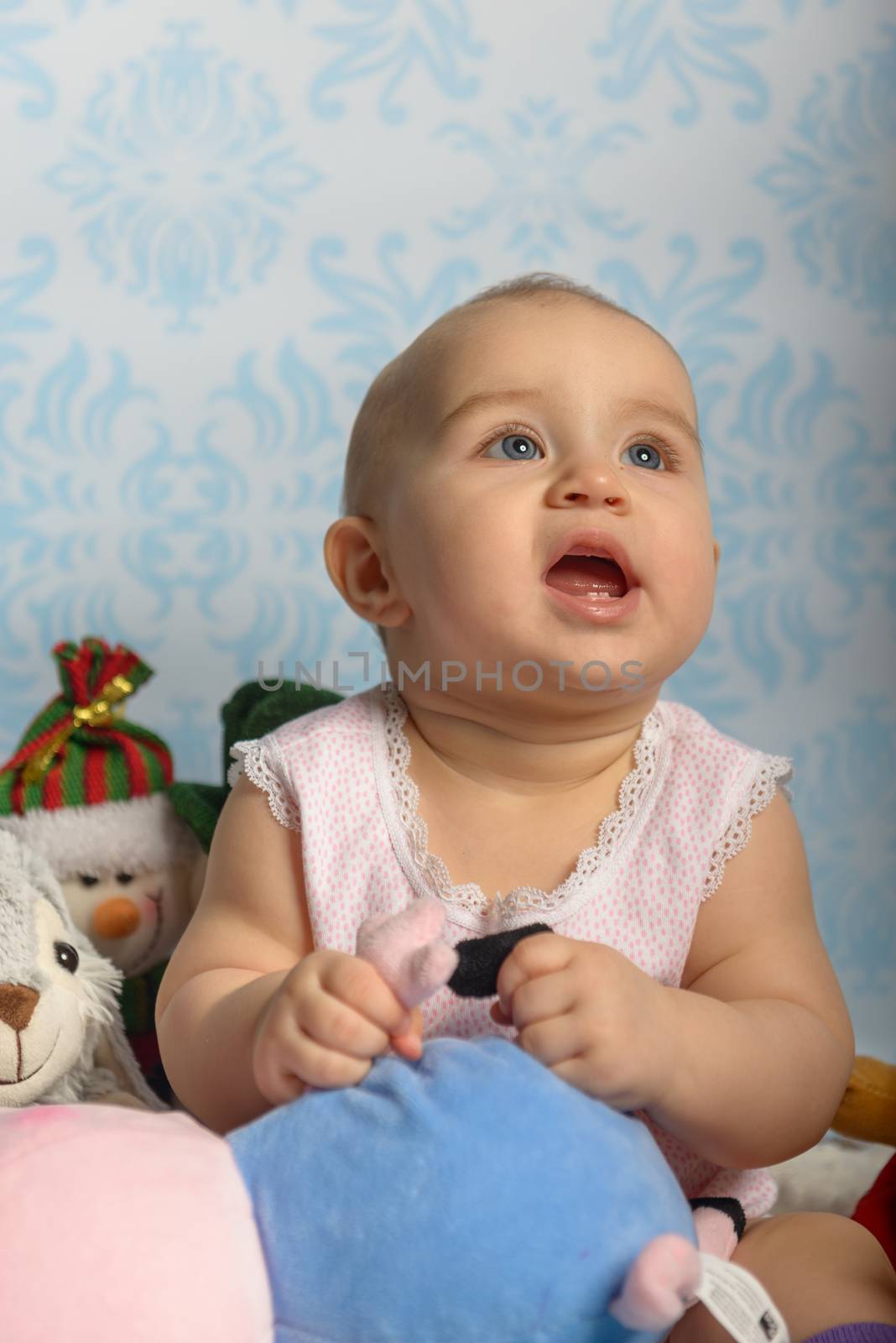 Portrait of adorable baby girl. Childhood. Authentic image