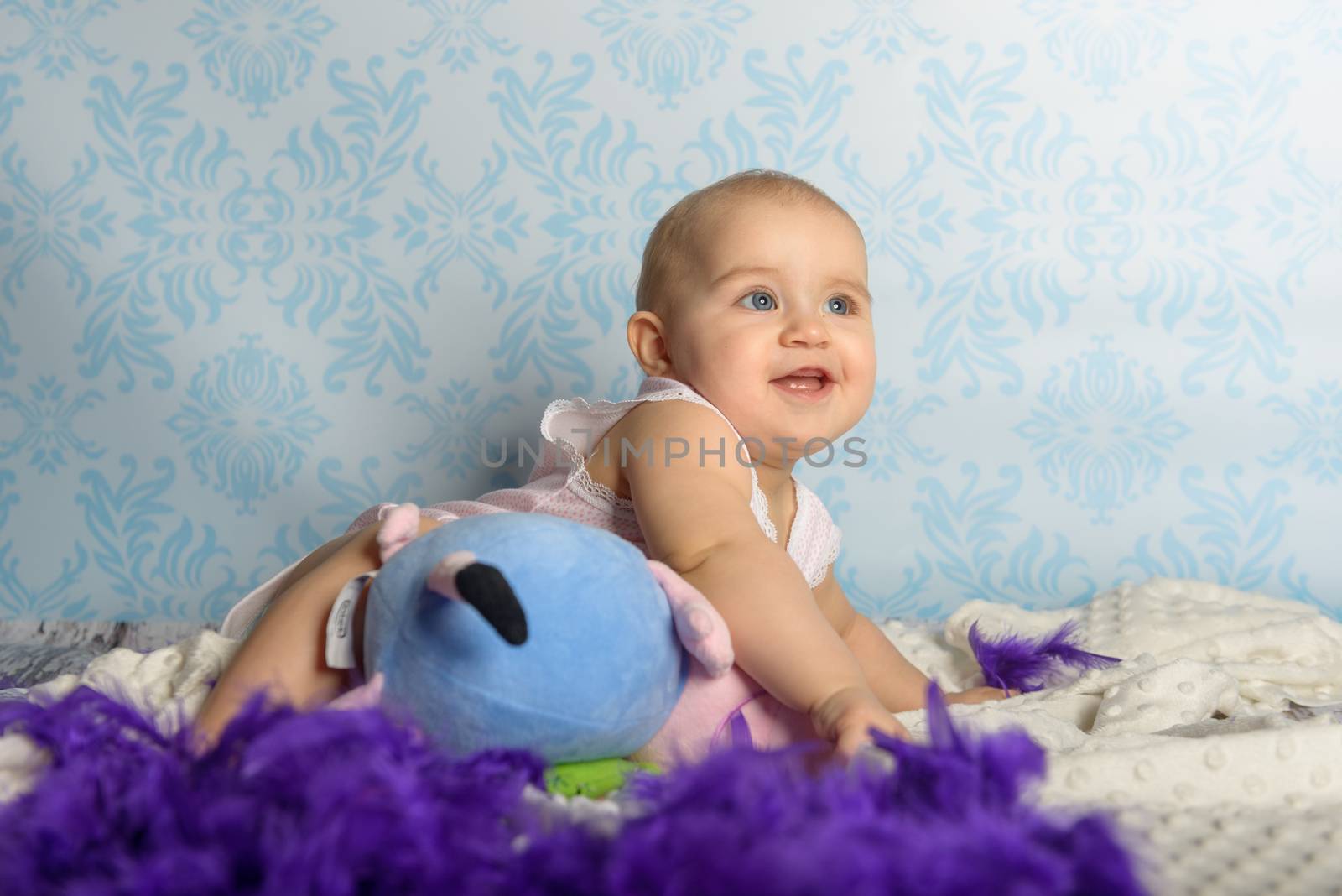 Portrait of adorable baby girl. Childhood. Authentic image