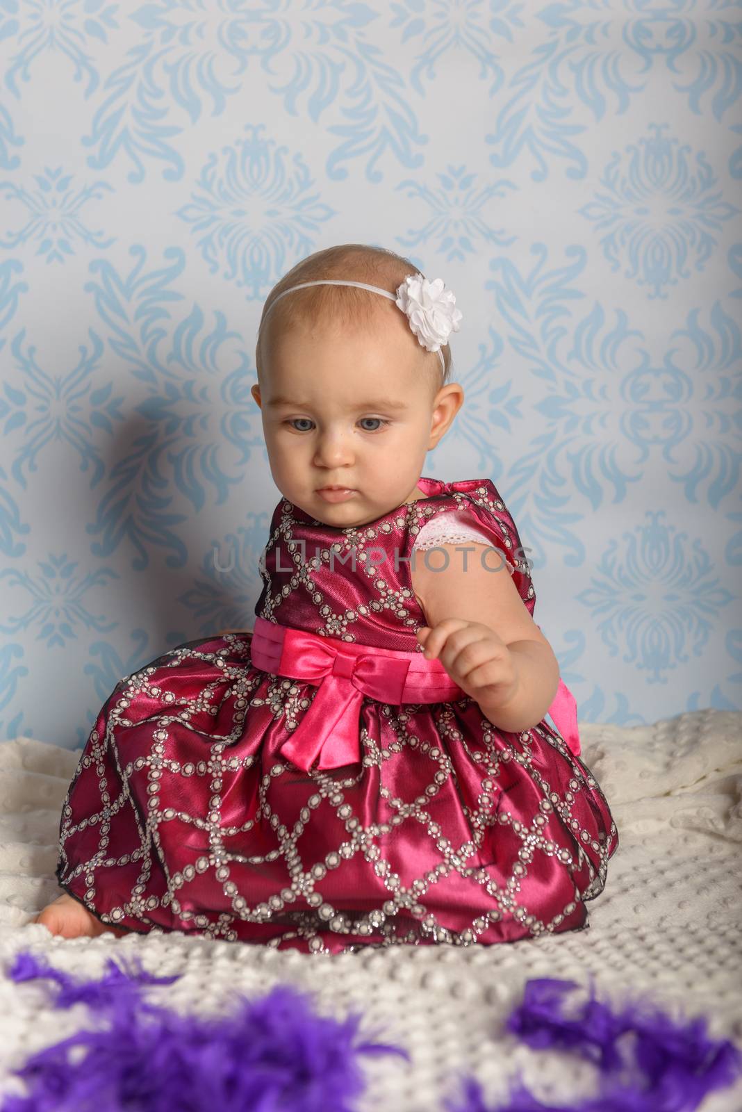 Portrait of adorable baby girl. Childhood. Authentic image