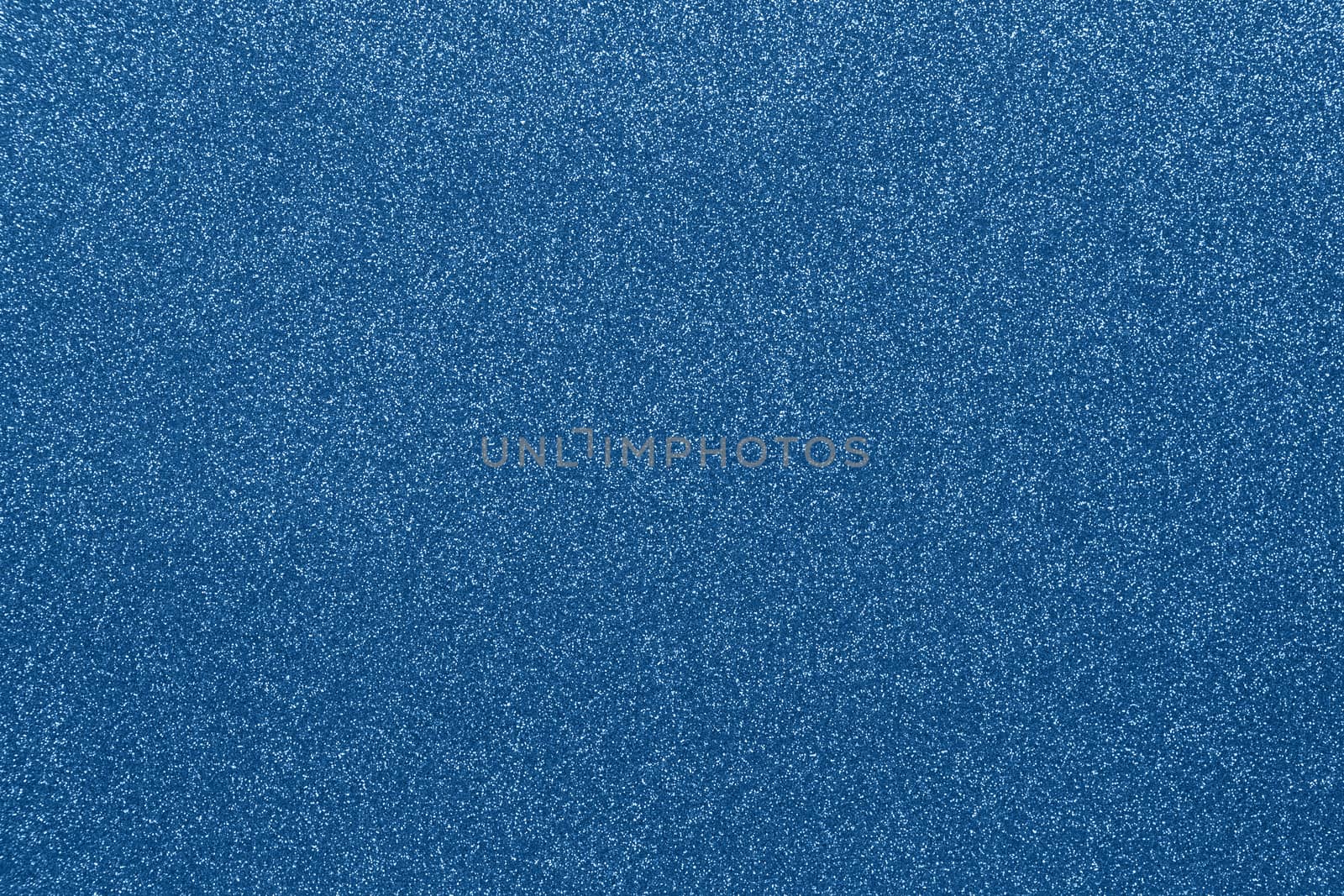 Sparkling festive background in Classic Blue colour, close-up. Copy space for text. Horizontal. Concept color of the year 2020, harvesting for mock up.