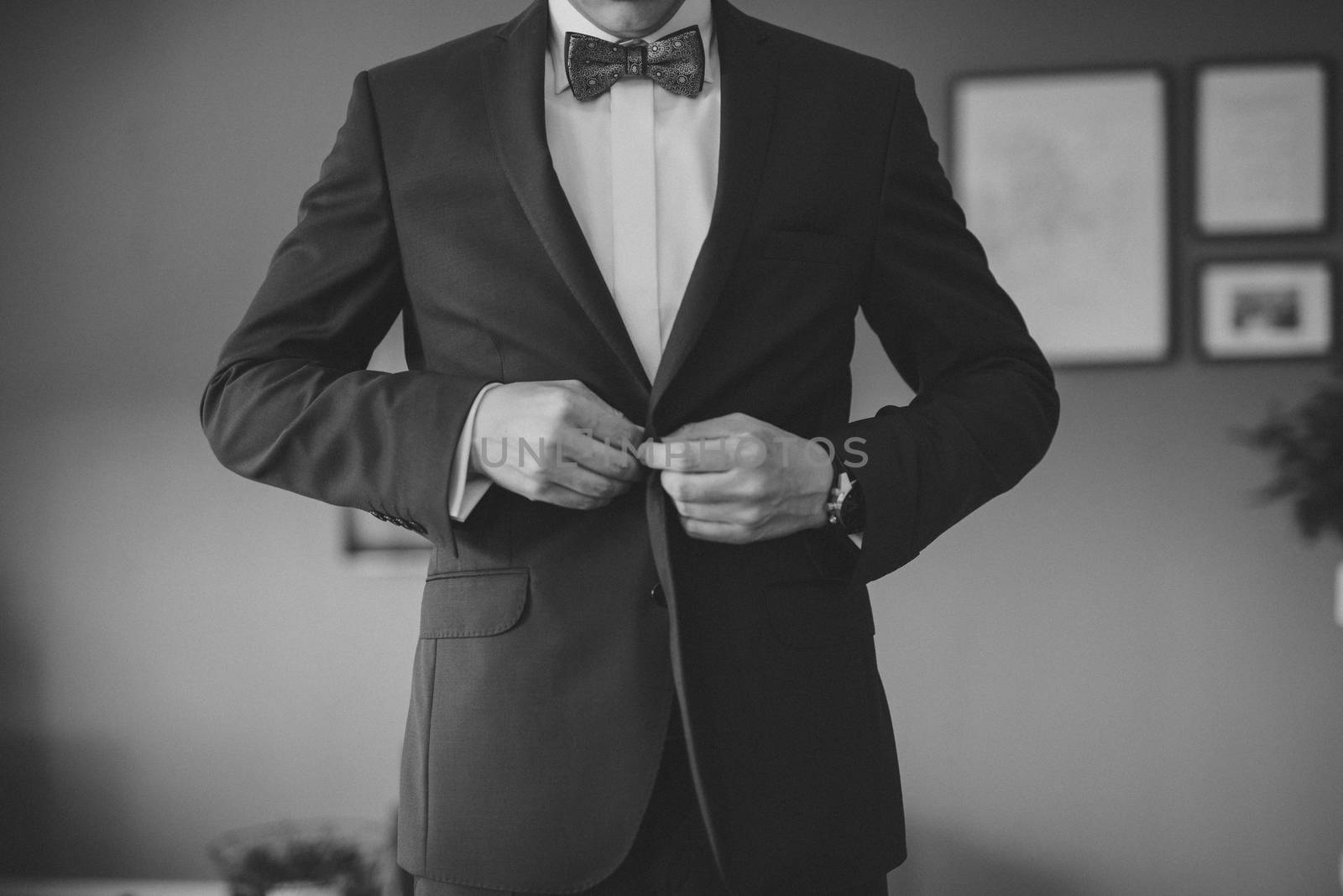 Groom's wedding accessories. Bow tie, suit, cufflinks, belt and shoes