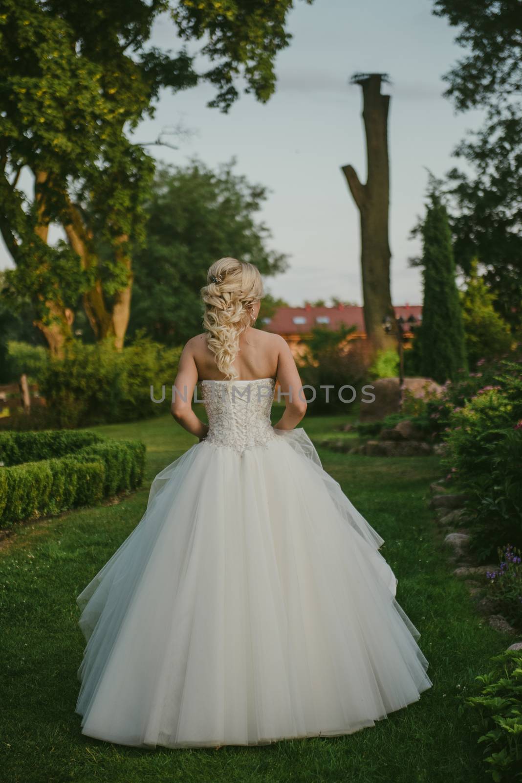 Bride and groom at a photo session in the nature.