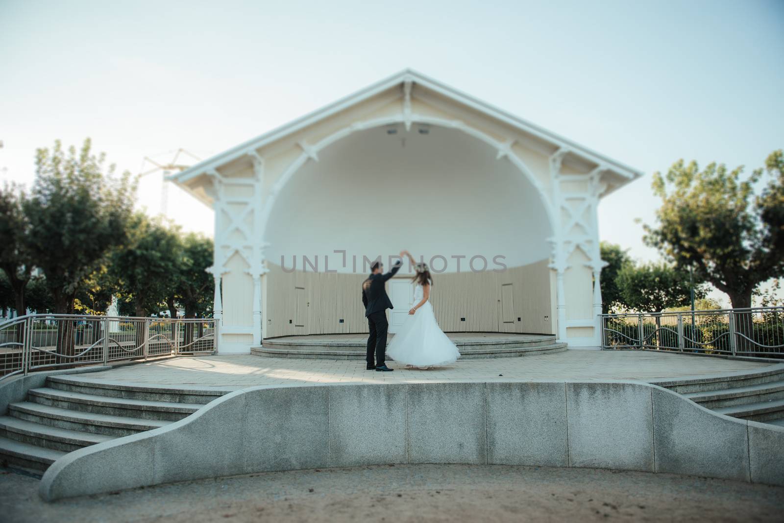 Bride and groom at a photo session in the nature.