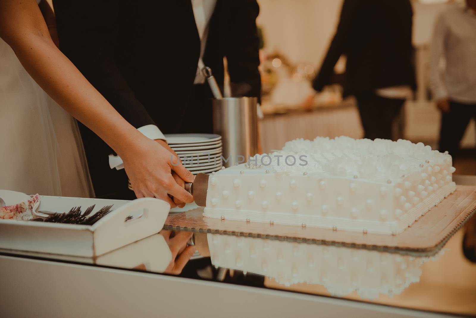 Delicious Wedding Cake at the party. Smoke and fire effects