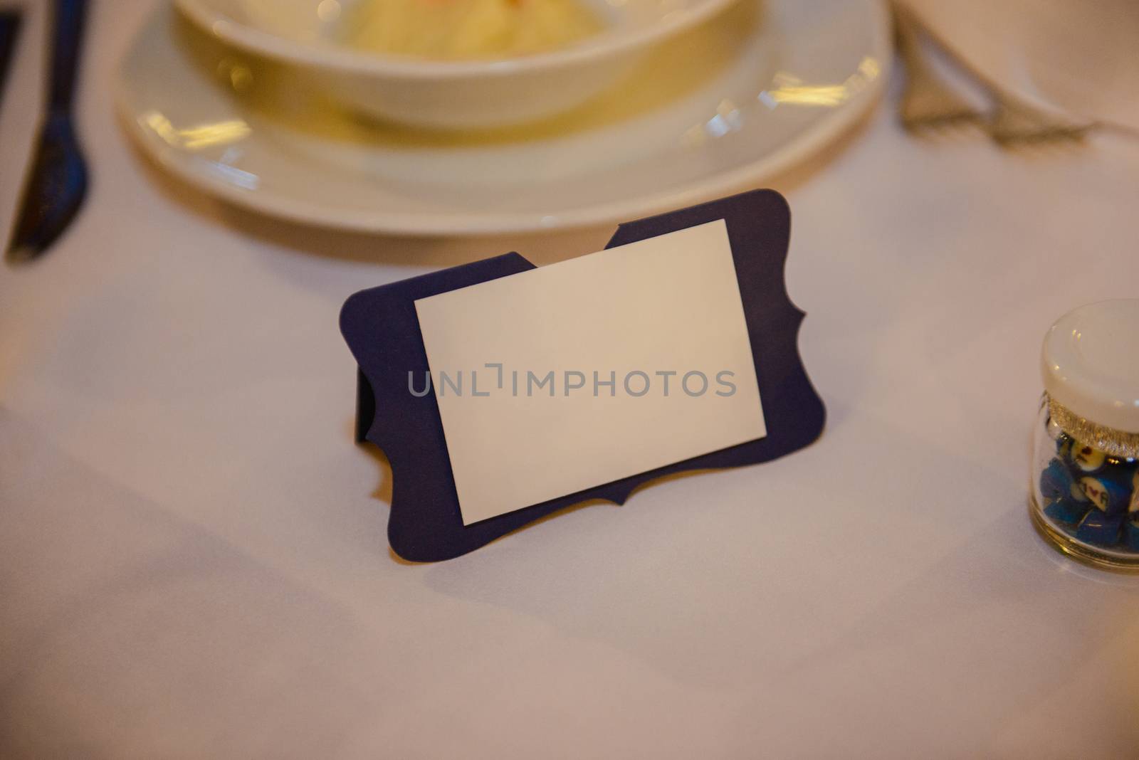 Beautifully decorated wedding table and other details at wedding hall. Wedding day