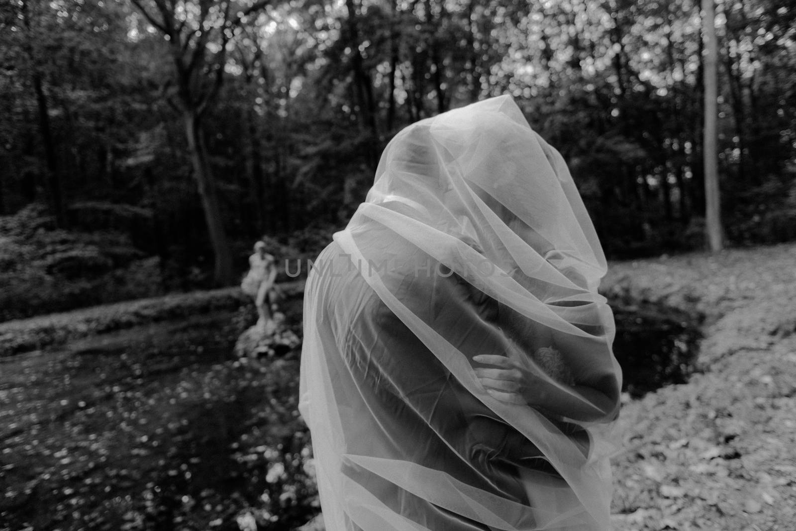 Bride and groom at a photo session in the nature.