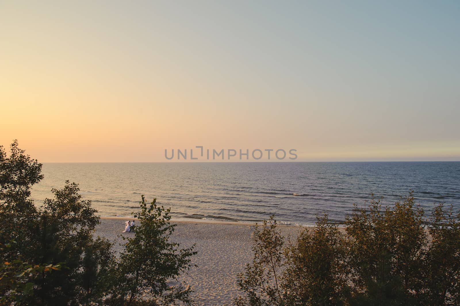 Baltic sea at beautiful sunrise in Poland beach.