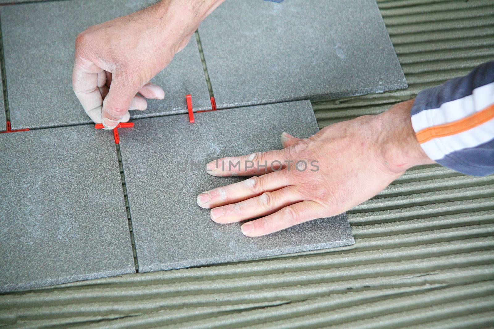 a tiler worker at work