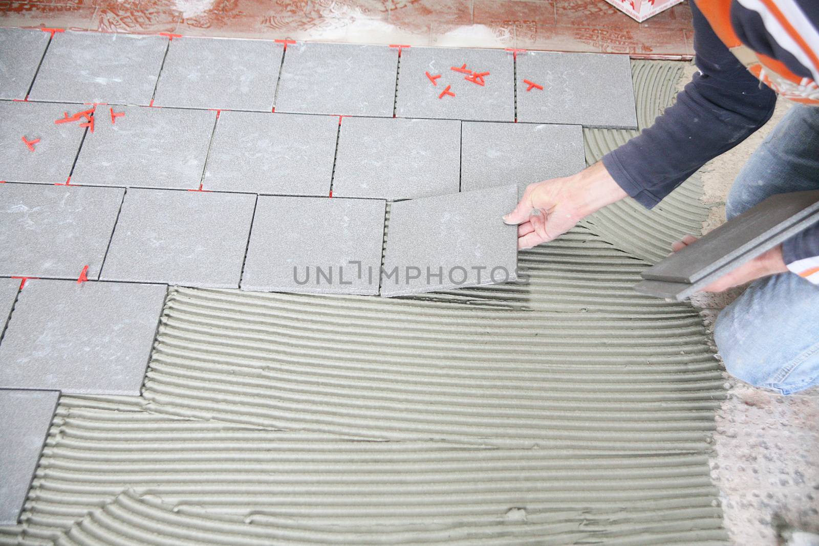 a tiler worker at work