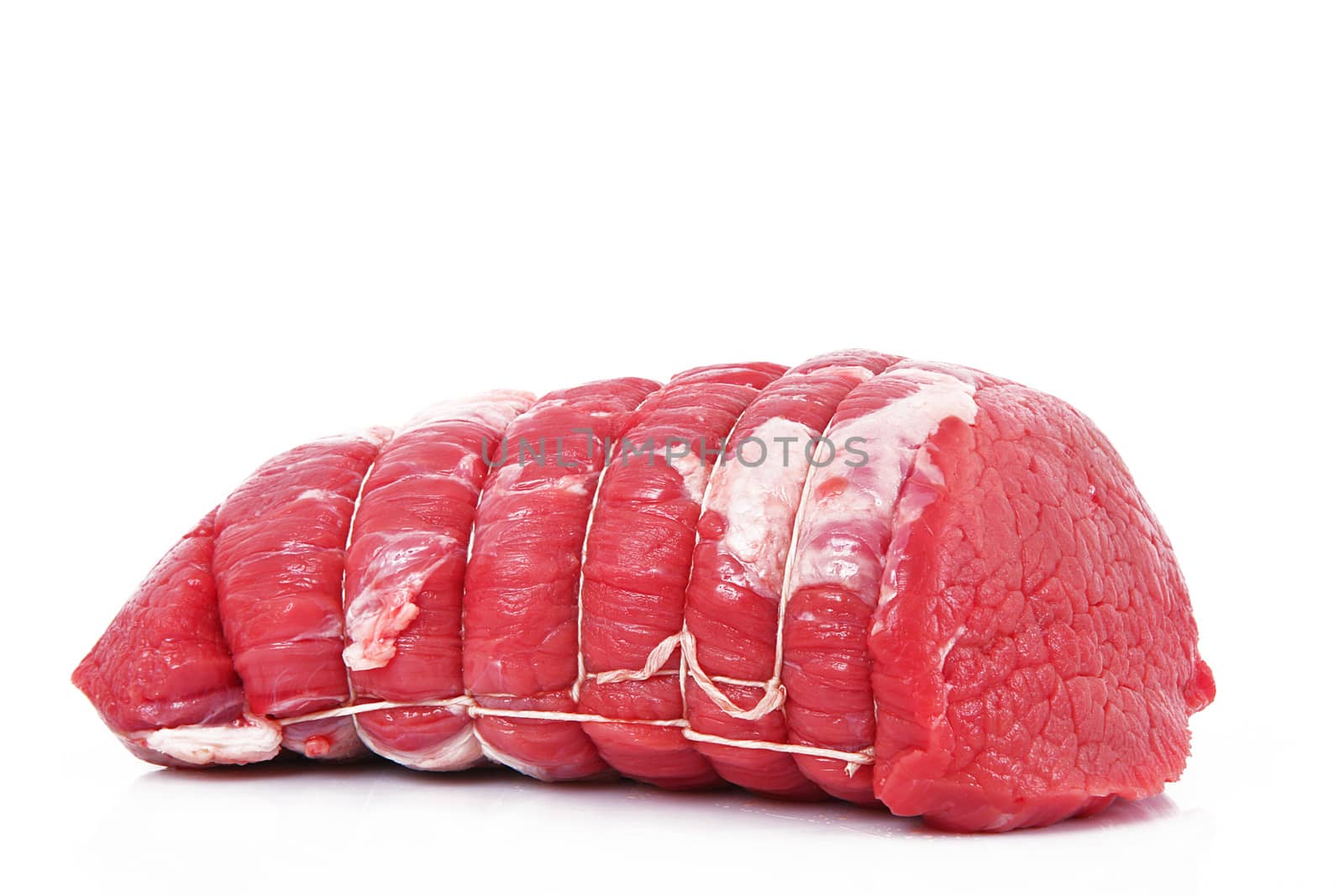 Raw beef meat for roast on white background