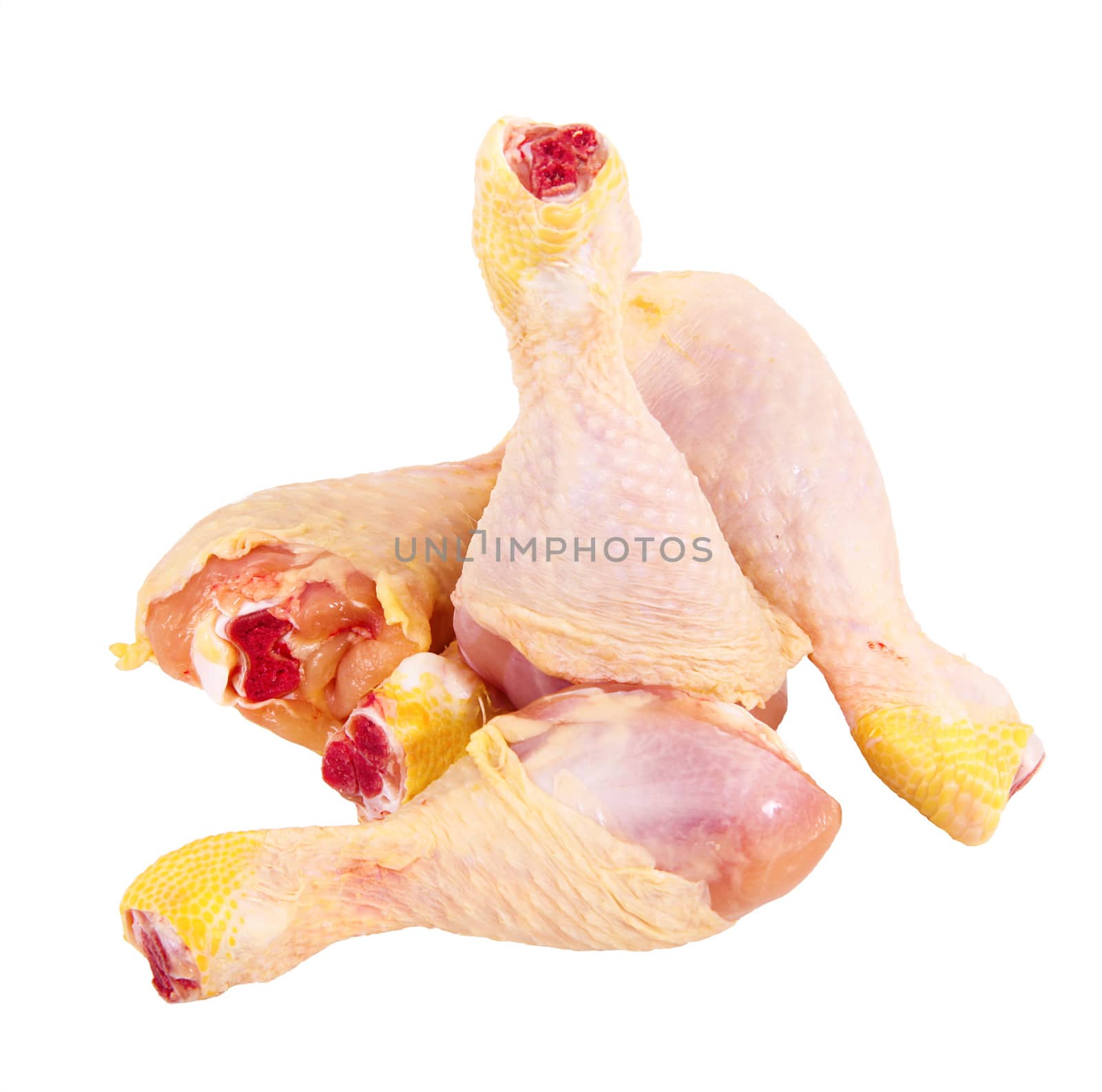 Fresh chicken thighs on white background