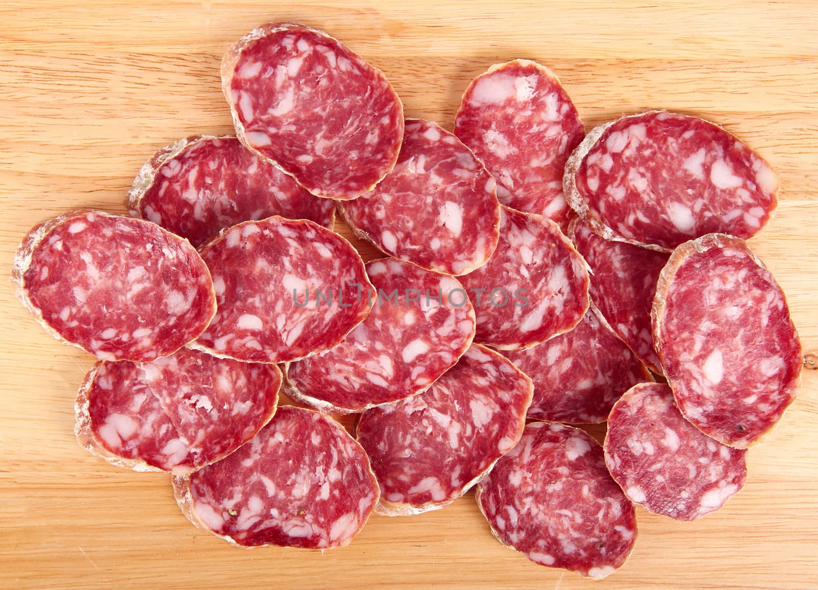 italian salami slice on chopping board background
