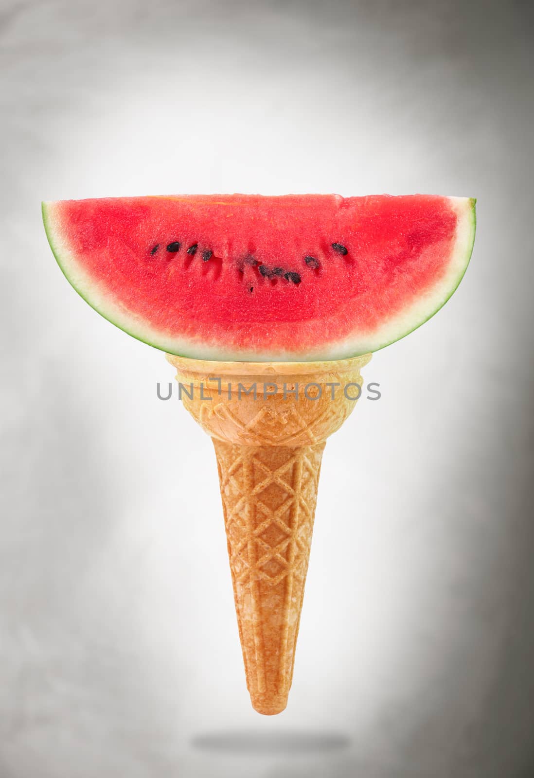 a Delicious ice cream cone with watermelon taste