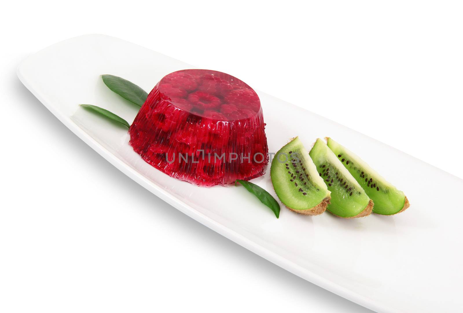 raspberries aspic with kiwi on white background