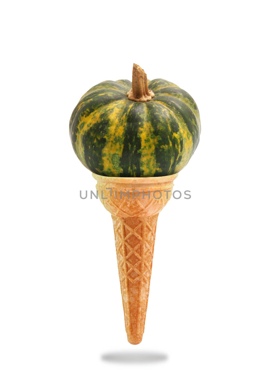 a Delicious ice cream cone flavored with pumpkin