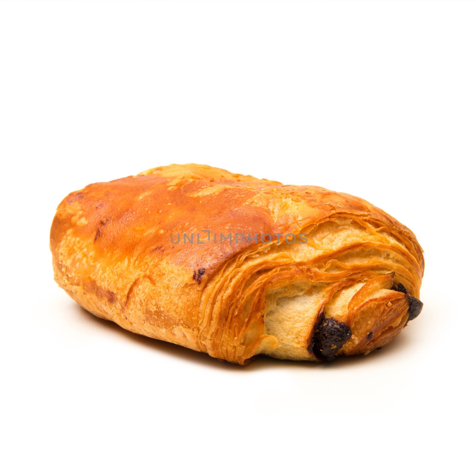 french croissant with chocolate on white background by photobeps