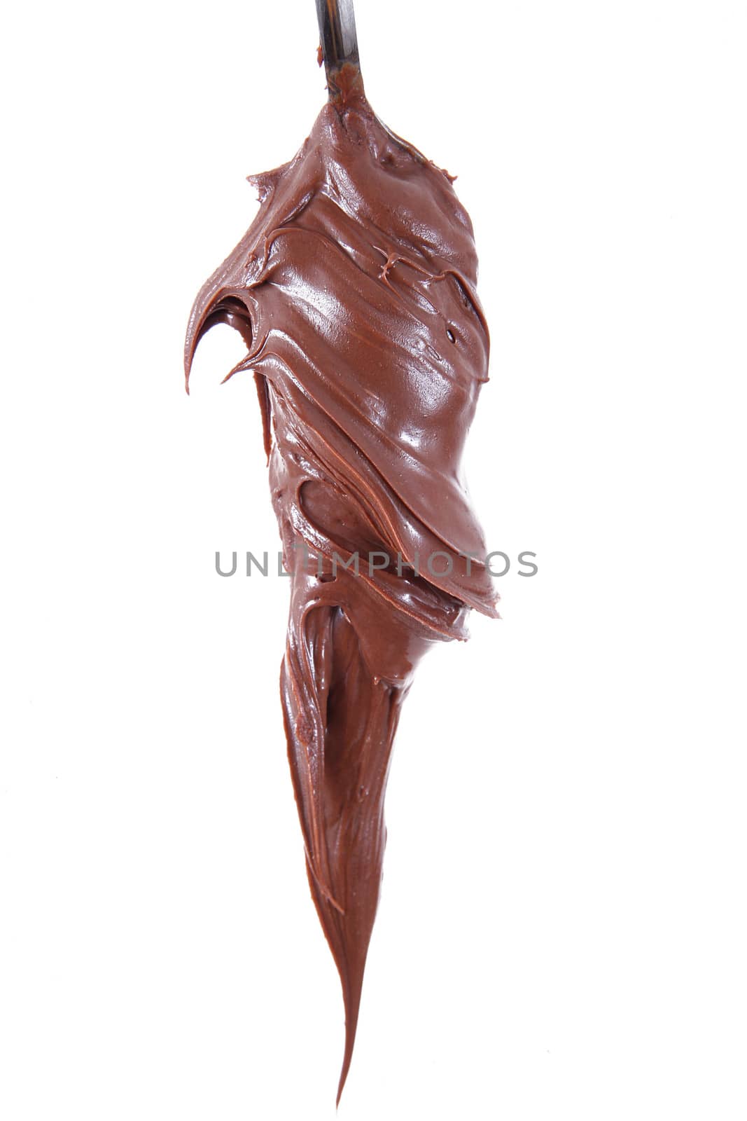 isolated chocolate cream on spoon on white background
