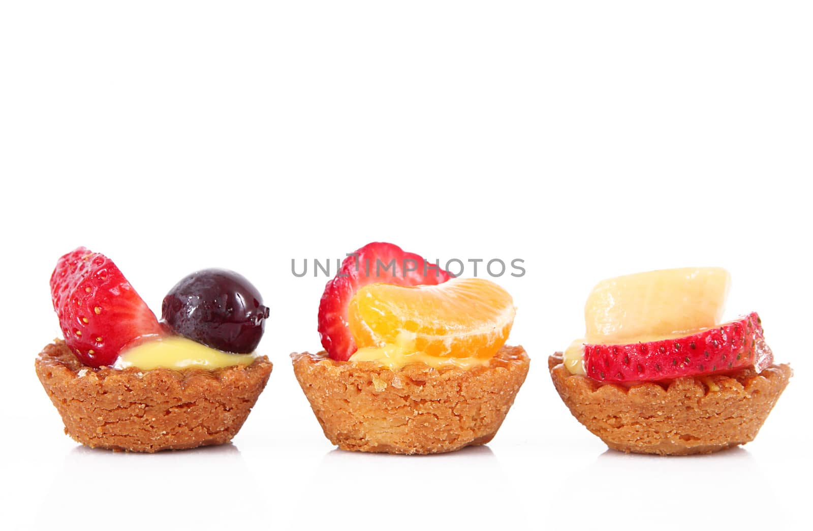 delicious fruit pastries on white background