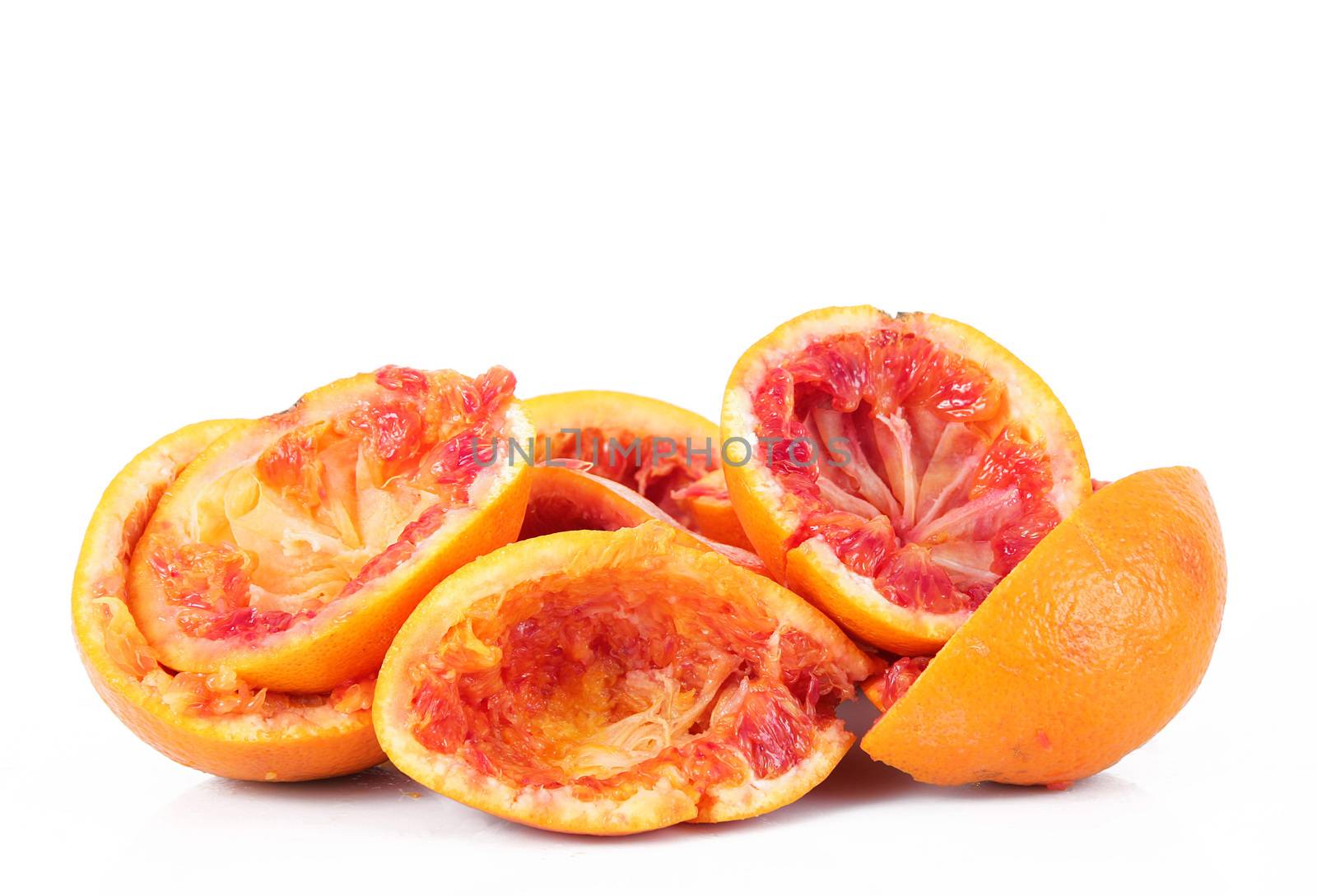 crushed orange on white background