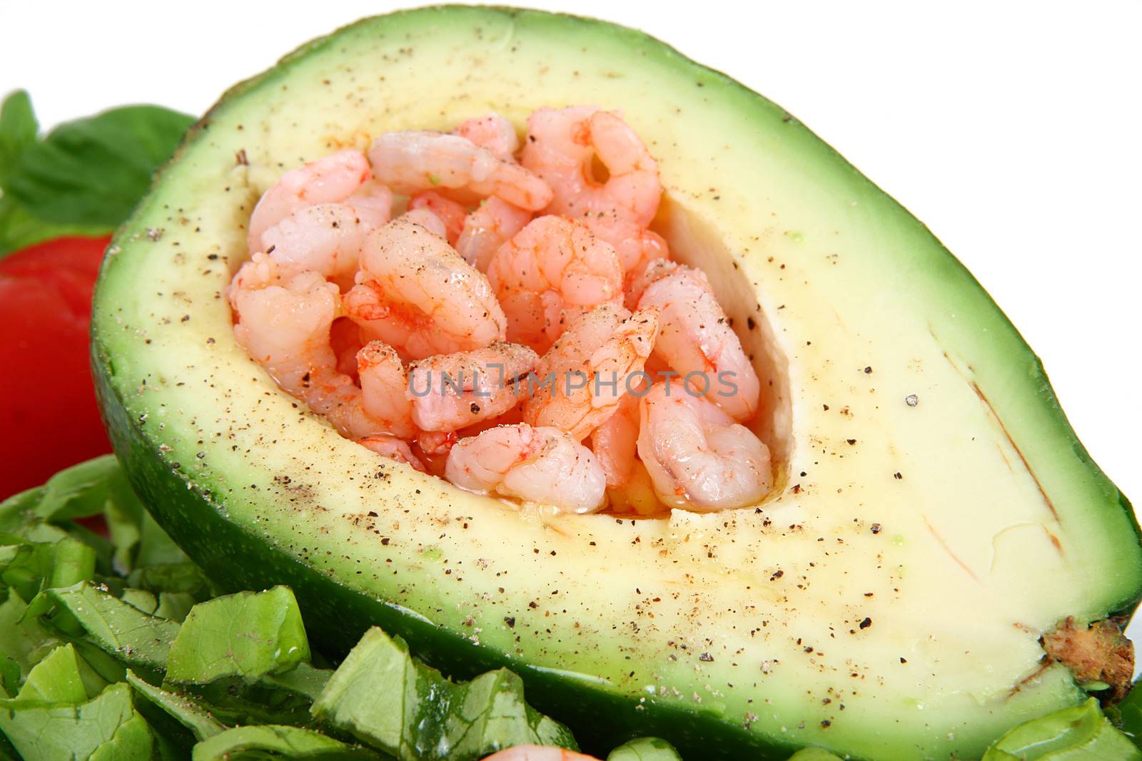 avocado with shrimp on white background