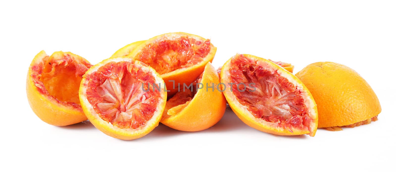 crushed orange on white background