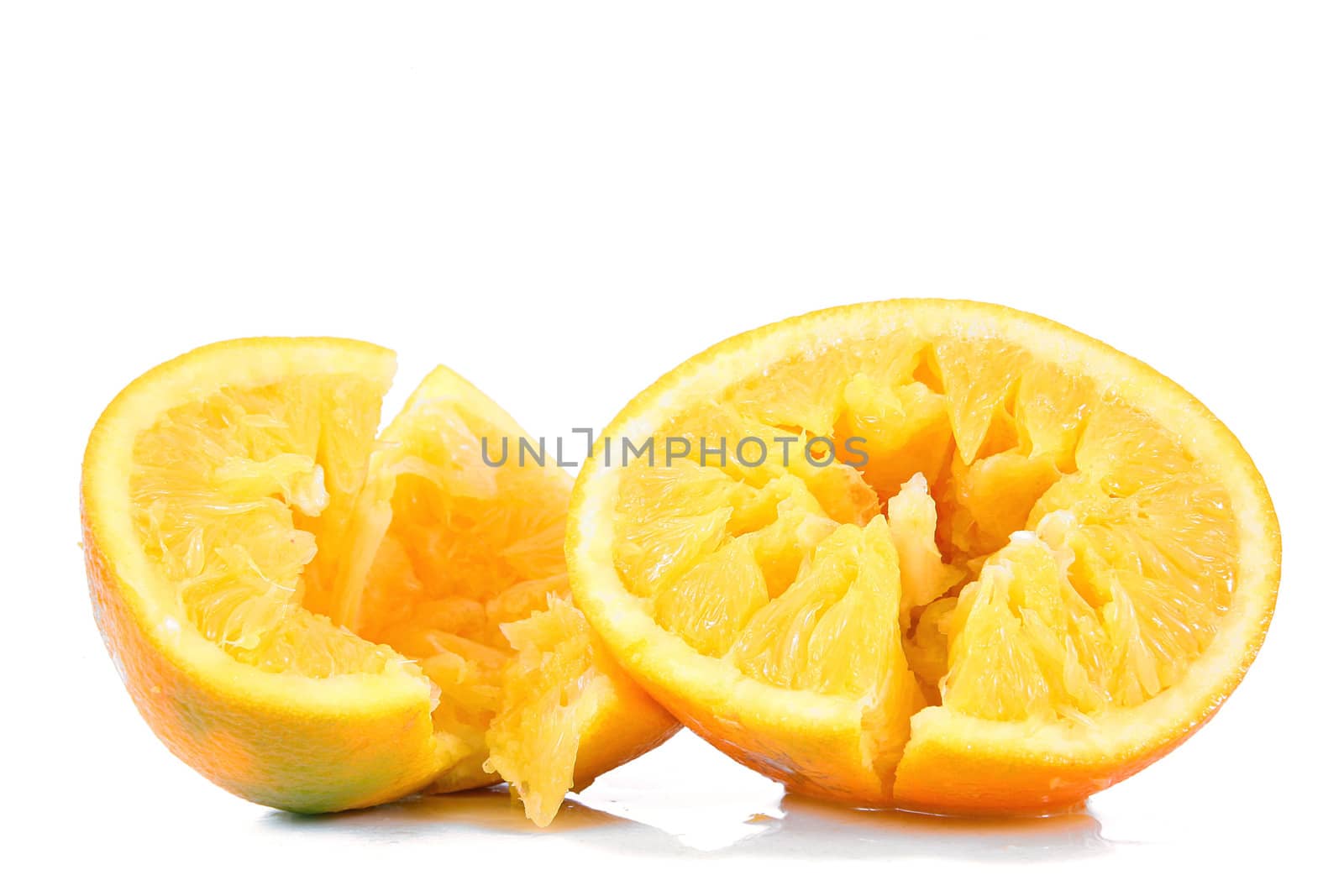 crushed orange on white background