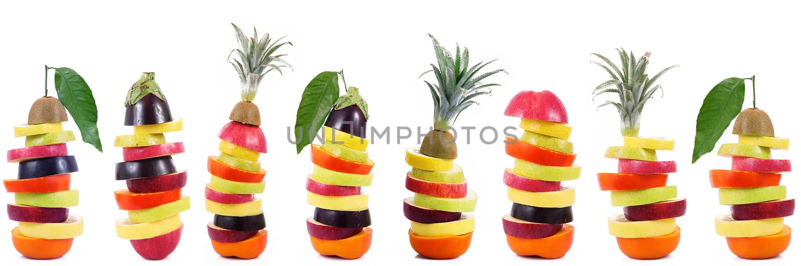 fresh fruit slices on white background