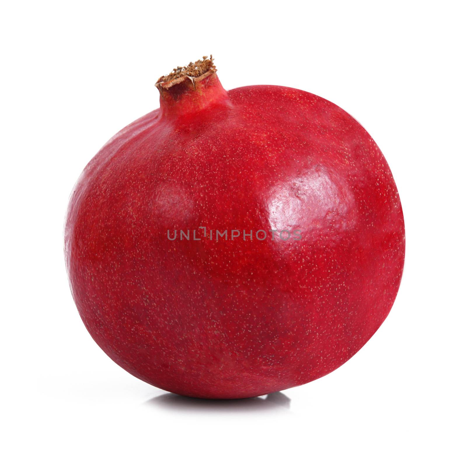 fresh pomegranate on white background