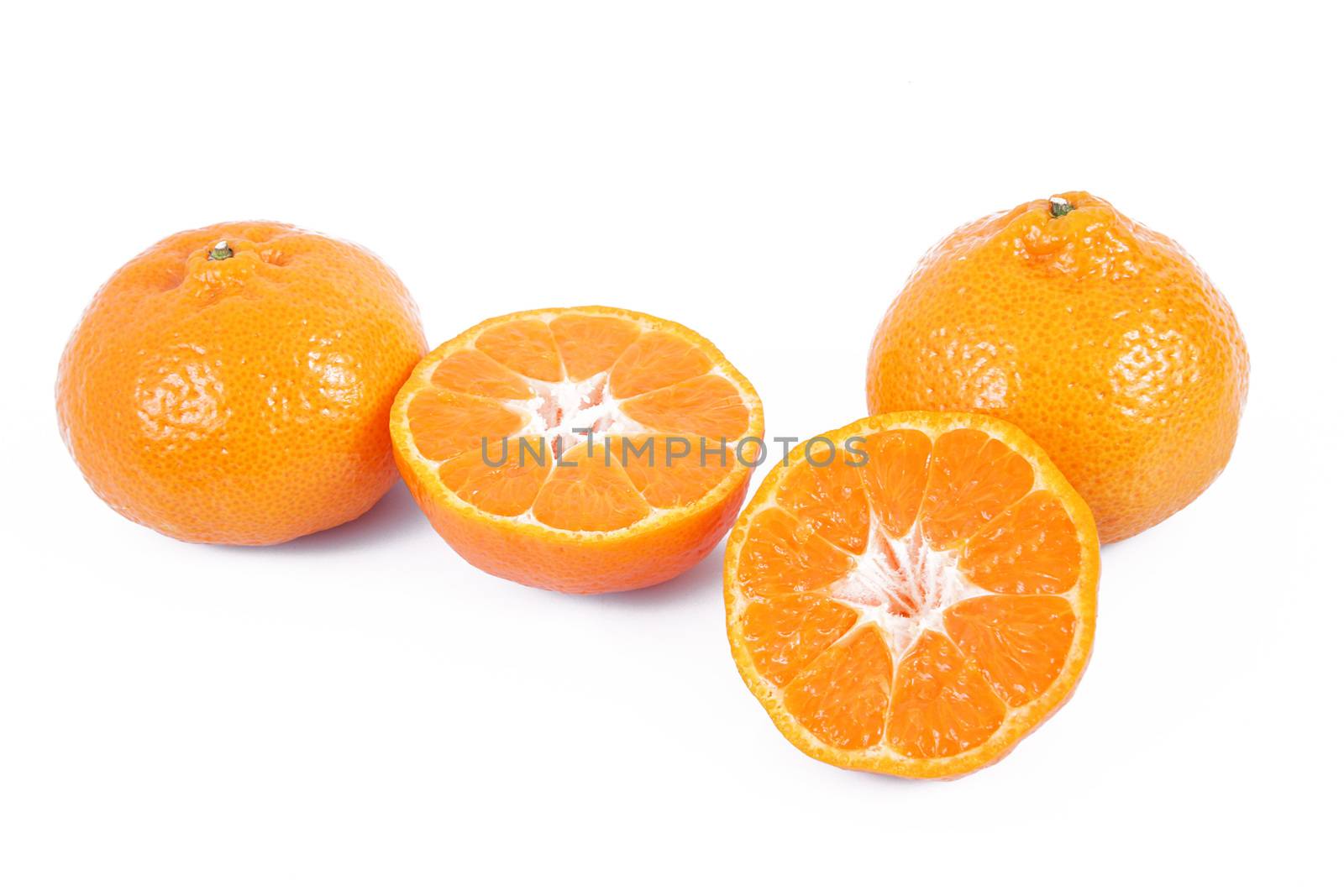 fresh tangerines on white background