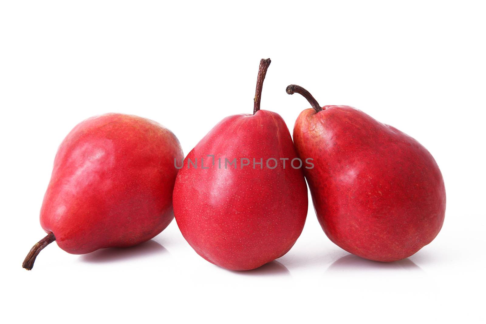 fresh red pears on white background