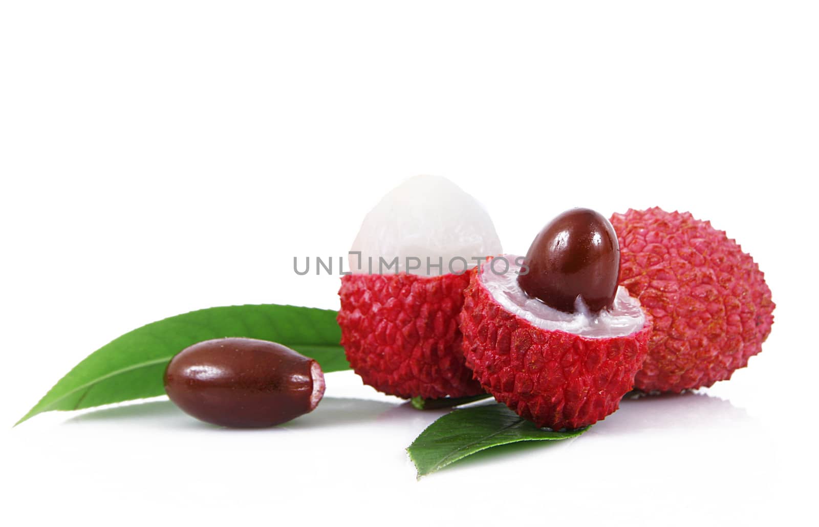 fresh lychees on white background
