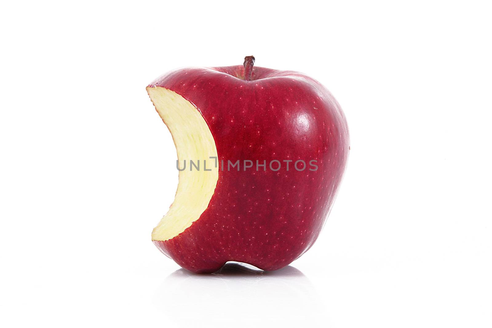 fresh apple with bite on white background