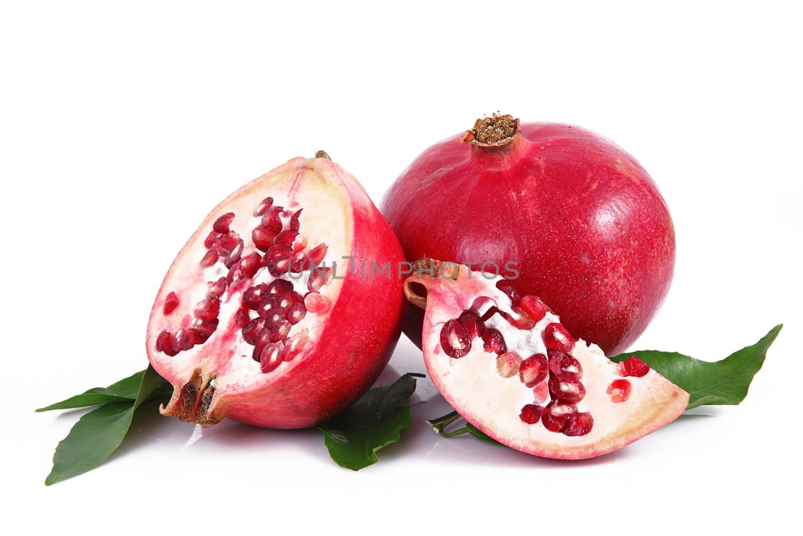 fresh pomegranate on white background