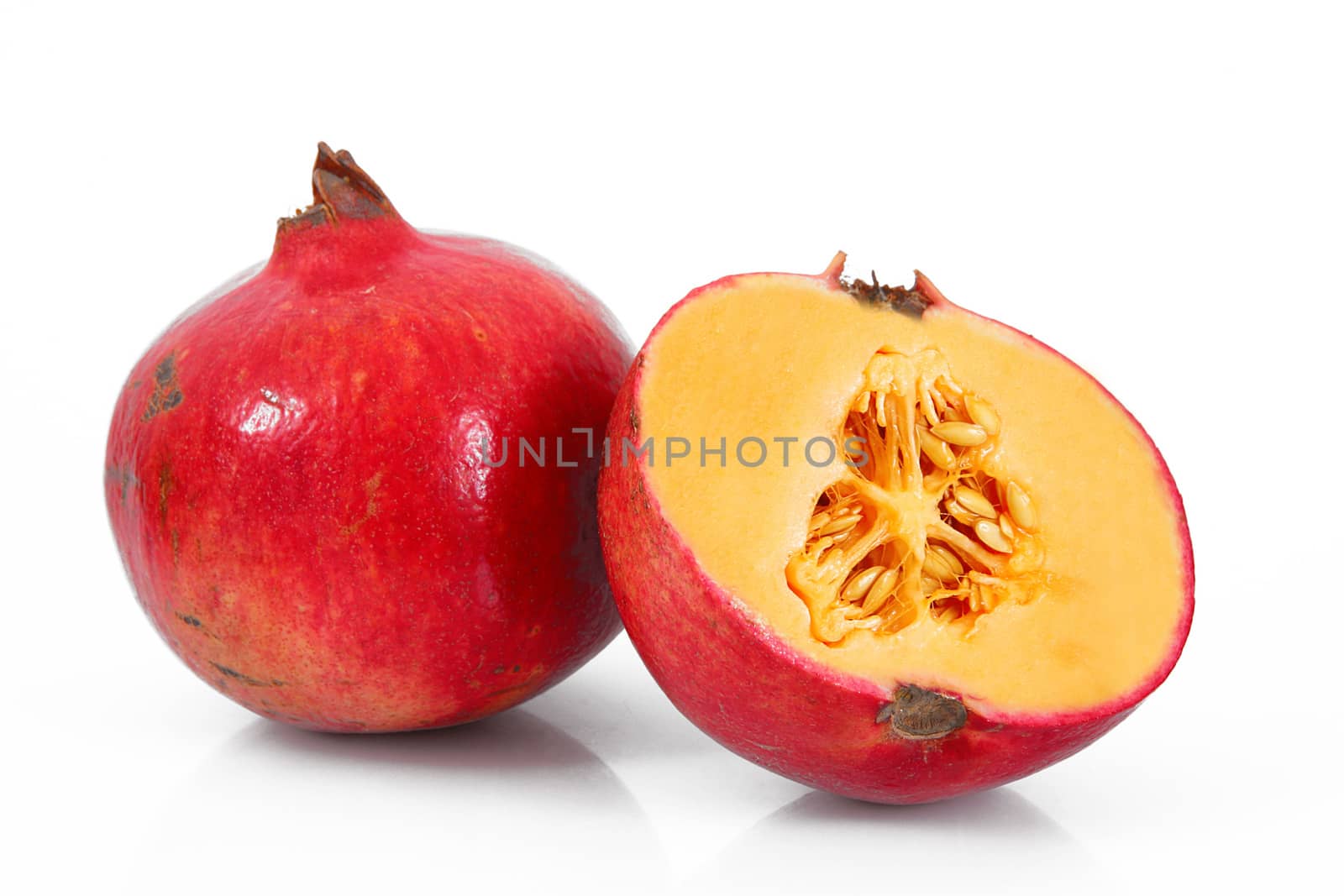 strange ibrid fruit melon-pomegranate